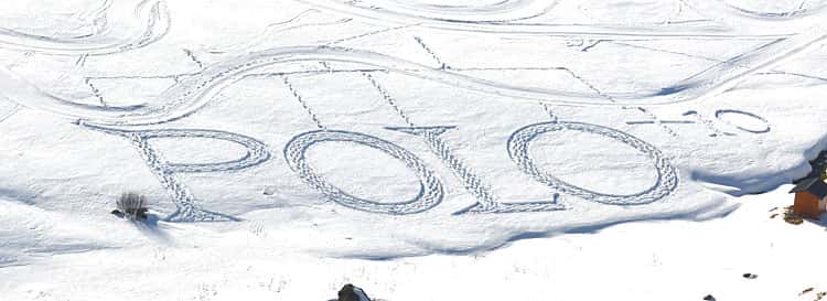 The POLO+10 logo in snow, drawn by snow artist Simon Beck